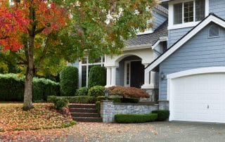 Front view of modern residential home during early autumn season