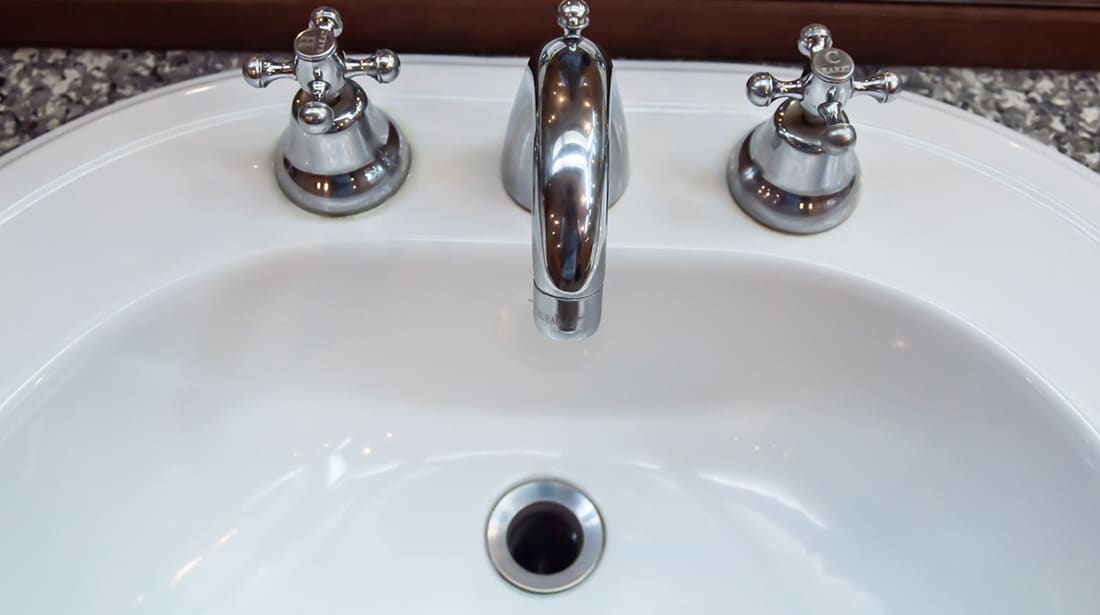 Bathroom sink, faucet and drain